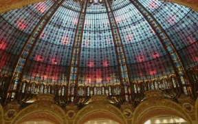 Interior of Galeries Lafayette in Paris, used as contextual luxury-retail imagery for an analysis of the uneven 2026 luxury-market recovery.