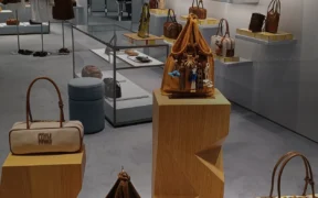 Miu Miu handbags and apparel displayed inside the brand’s Elements boutique in Hong Kong in May 2025.