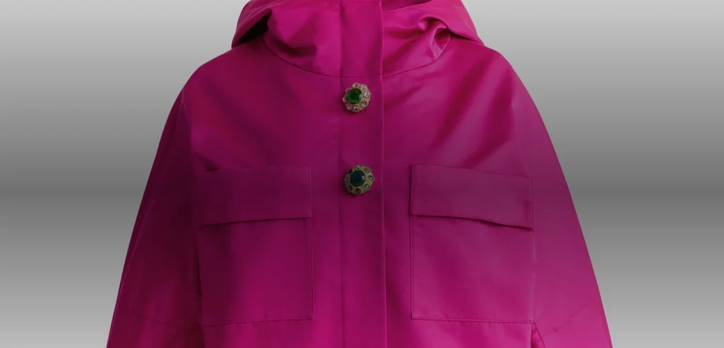 Fuchsia Duchesse satin hooded jacket from Humberto Leon’s Fall 2026 St. John collection, shown front-facing against a light background.