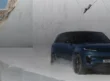 Blue Range Rover Sport Electric driving through a white Carrara marble quarry.