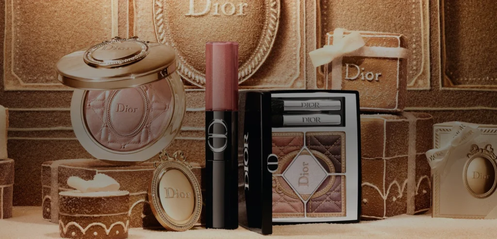 Dior Holiday 2026 Cinnamon Glaze makeup collection arranged in a gold gingerbread-inspired holiday set.