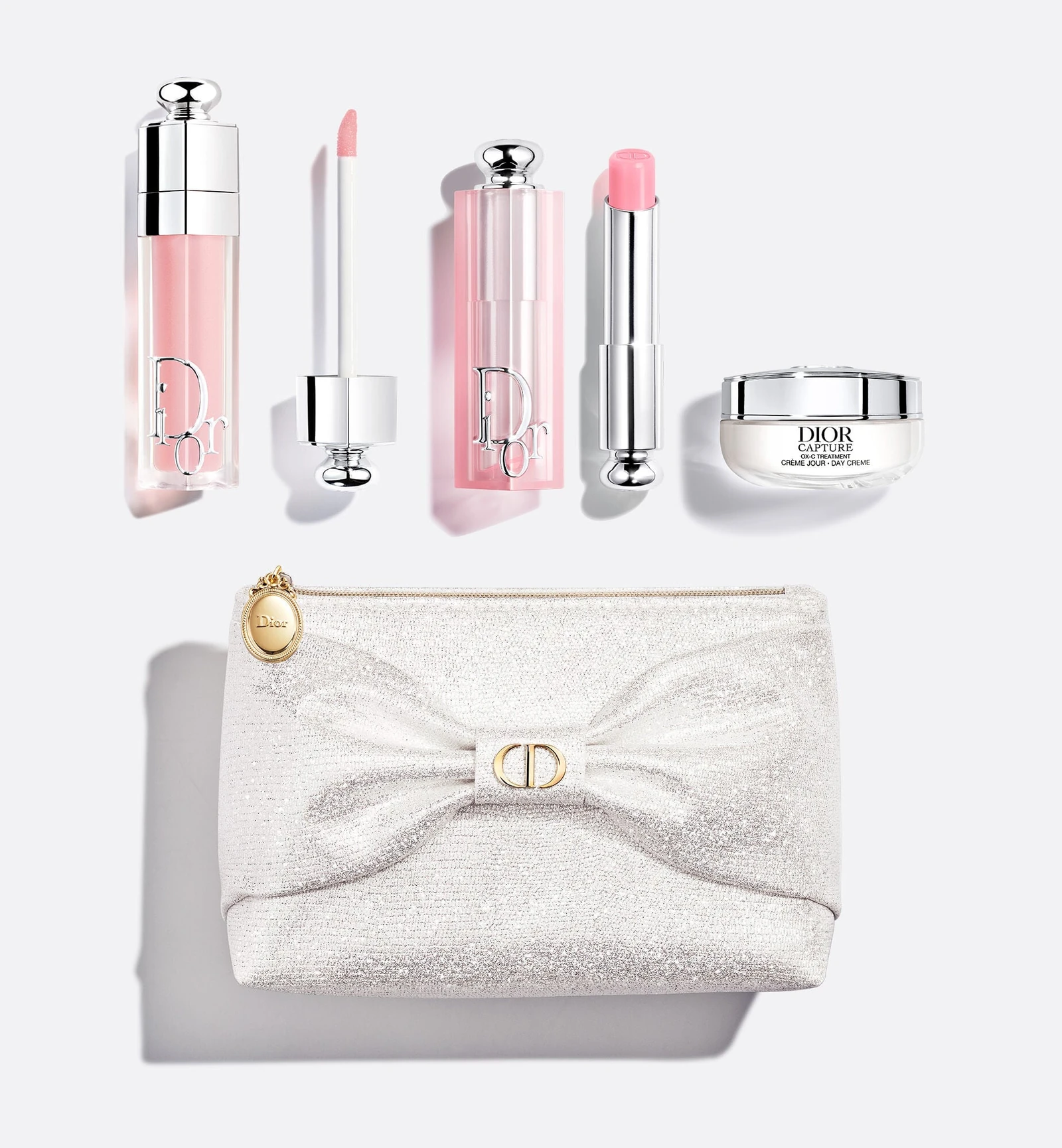 Dior's limited-edition holiday gift pouch with a bow and medallion detail.