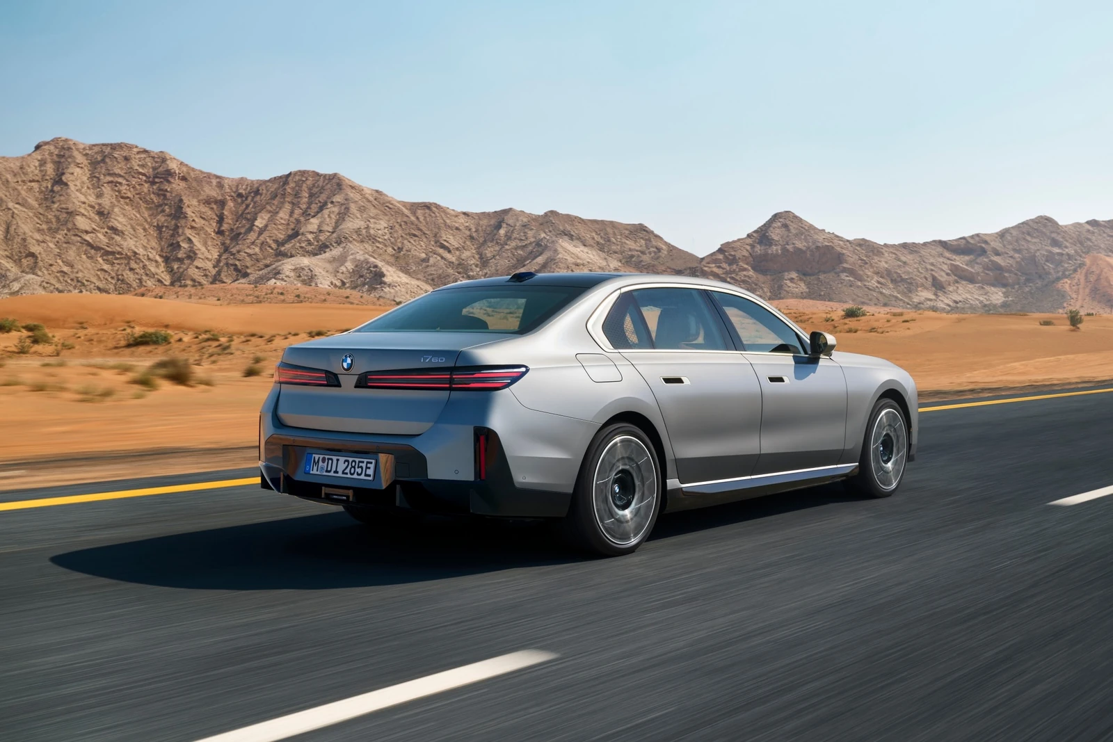 A 2026 BMW 7 Series luxury sedan photographed on the road.