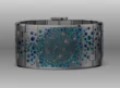 A white-gold cuff set with diamonds and deep-blue gemstones.